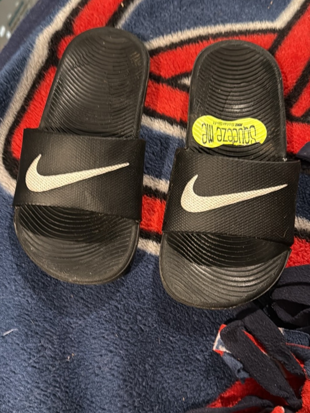 Nike Kids Black Slide Sandals with White Swoosh